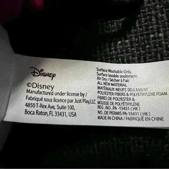 Disney Holiday Minnie Plush with green bow & red ear muffs. 16 1/2” high. - Picture 3 of 3